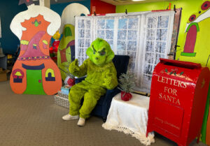 The Grinch at the Jolly Holiday Market